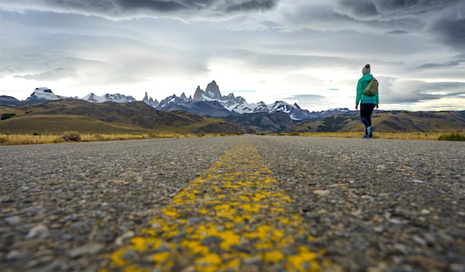 Standing on the Ruta 40 just outside of El Chaltén in Patagonia with mountains in the distance