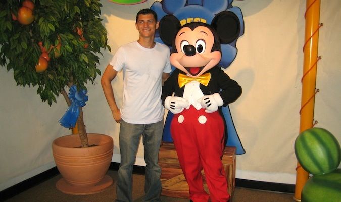 me and mickey mouse at a cheesy tourist activity in Disney world