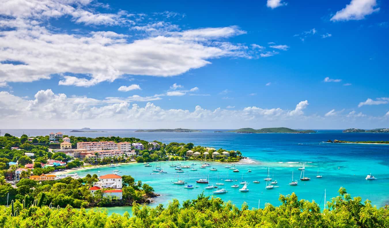 Boats anchored off the beach of Cruz Bay on St. John, VI