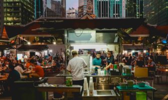 A food hawker in ASia serving delicious local food