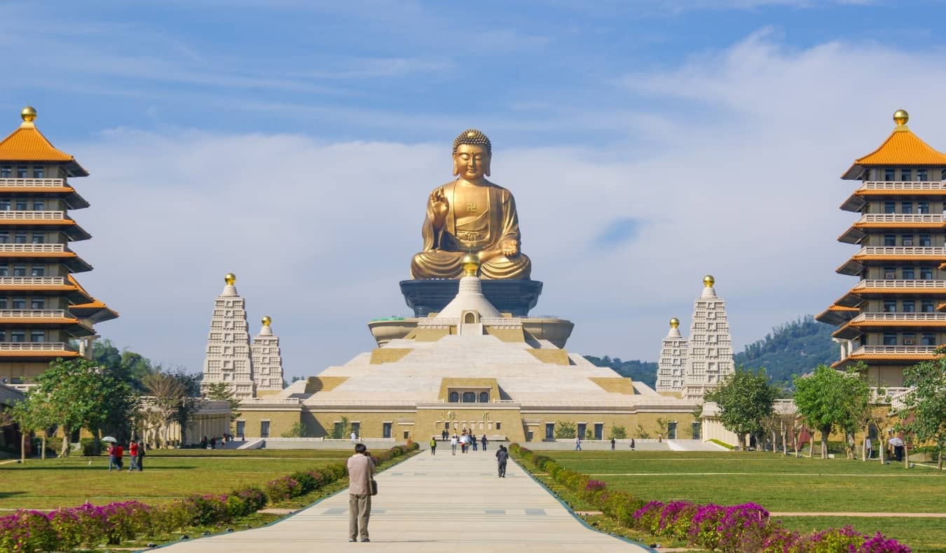 Expansive path with pagodas, leading up to the giant golden Big Budda, at Fo Guang Shan Monastery in Taiwan