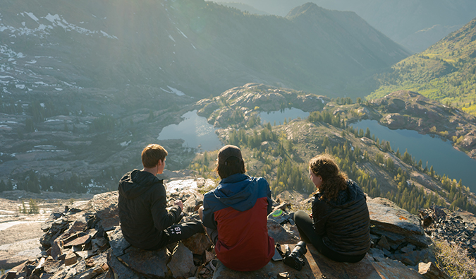 a group of people hiking at Lake Blanche, United States