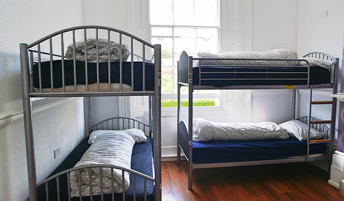 Simple metal bunk beds at Onefam Camden, London