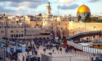 people in front of the Western Wall in Israel