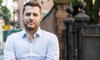 A headshot of best-selling author Mark Manson