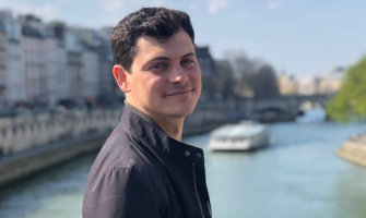 Matt Kepnes on a bridge over a canal in Paris