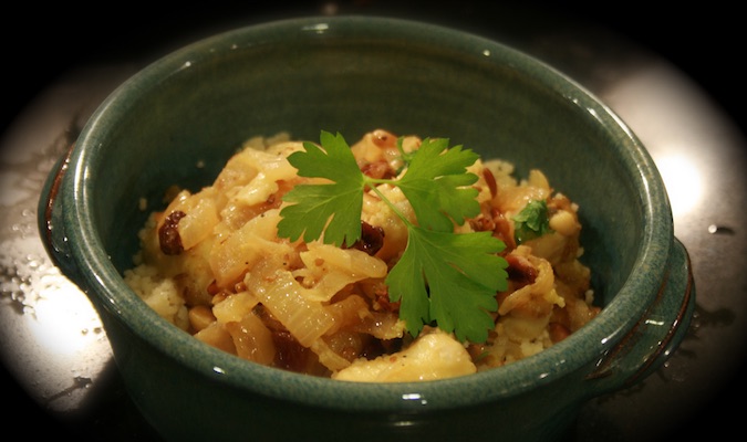 Delicious Moroccan chicken tagine in a clay dish