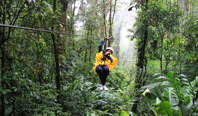 solo female minority traveler in southeast asia in a field exploring