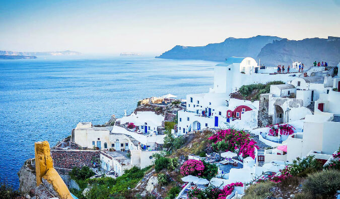 classic shot of the white and blue buildings of Santorini in Greece