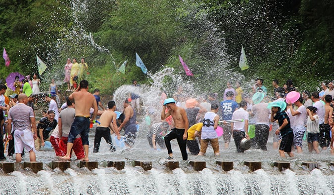 People having a water fight during Songkran, the Thai New Year