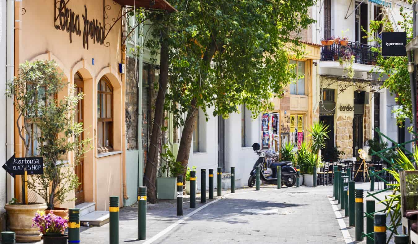 A quiet empty street on a sunny day in the Psyrri neighborhood in Athens, Greece