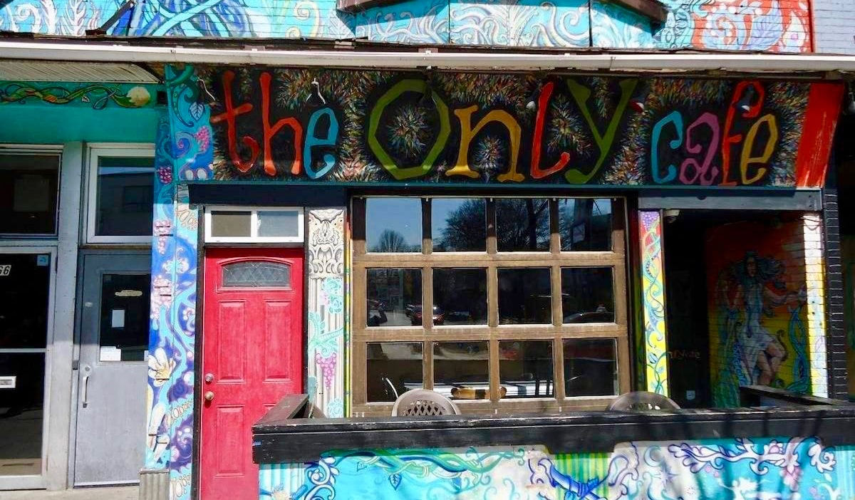 The colorful exterior of The Only Backpacker's Inn in Toronto, Canada