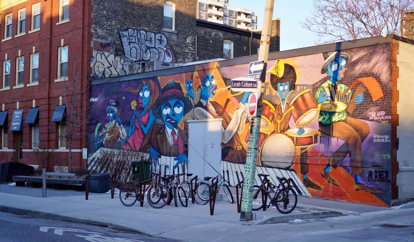 Street art on an old building on a quiet street in the Annex in Toronto, Canada