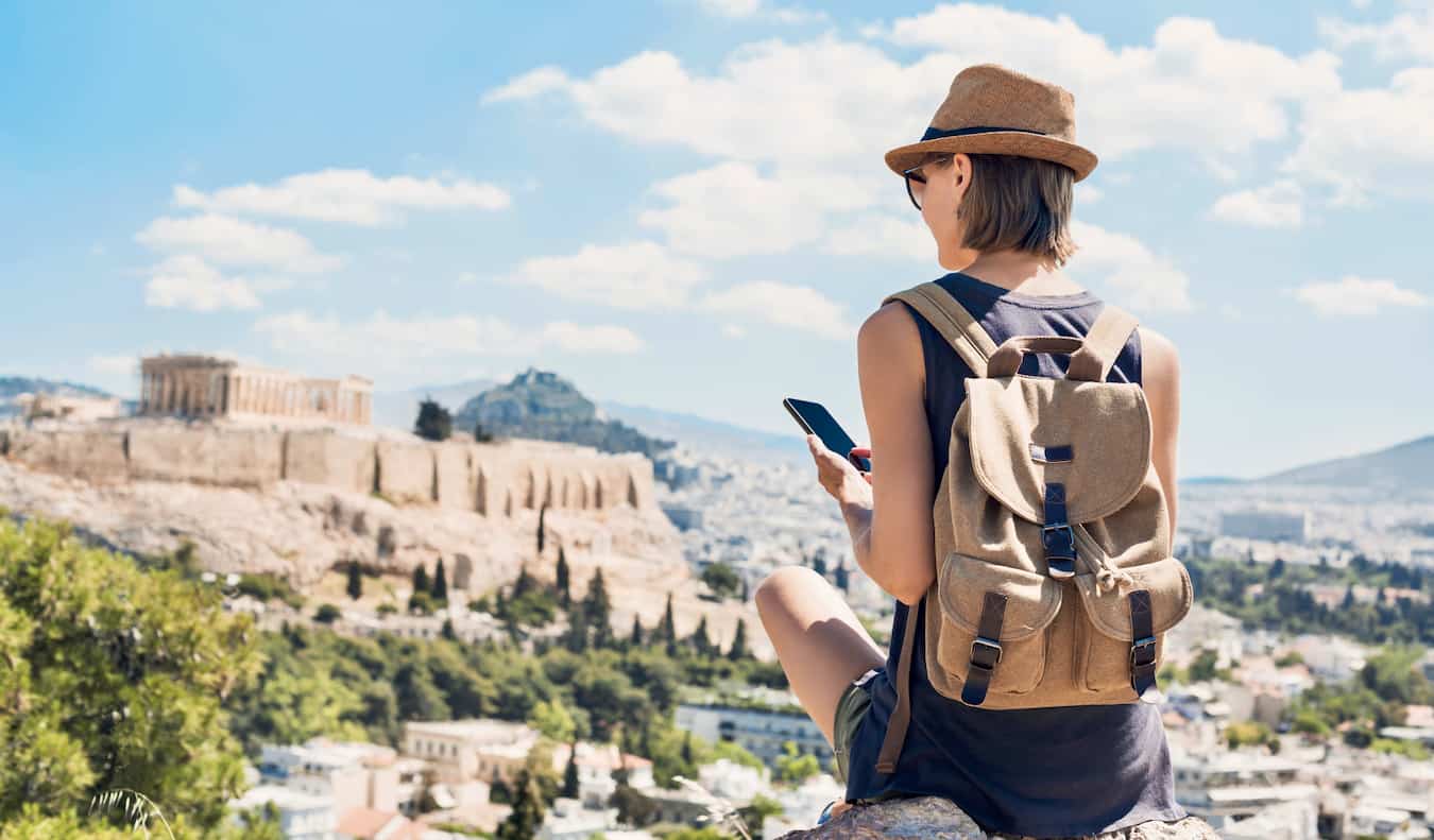 A woman traveling in Europe with a smartphone