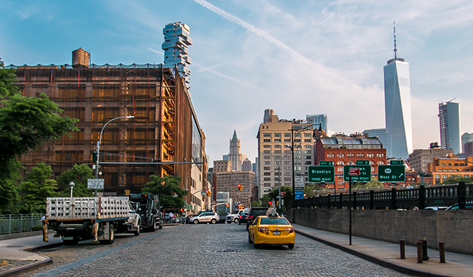 street view in Tribeca of a quiet street with a single yellow taxi