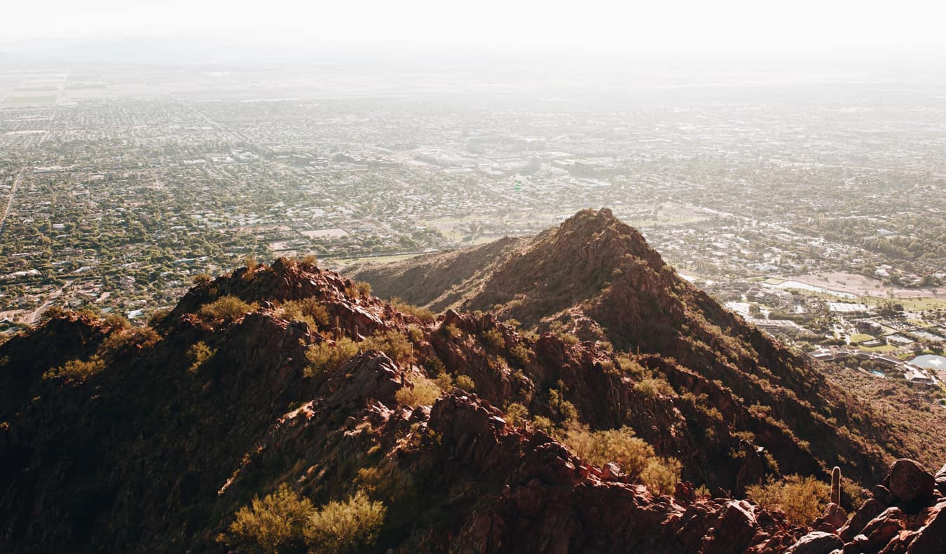 The view overlooking Phoenix from a rocky mountain above the city