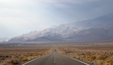 A car driving an open road in Death Valley, USA