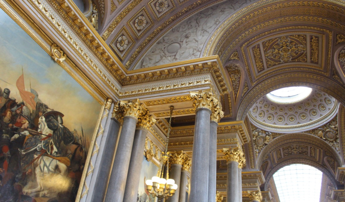 the lavish interior of the historic Palace of Versailles in France